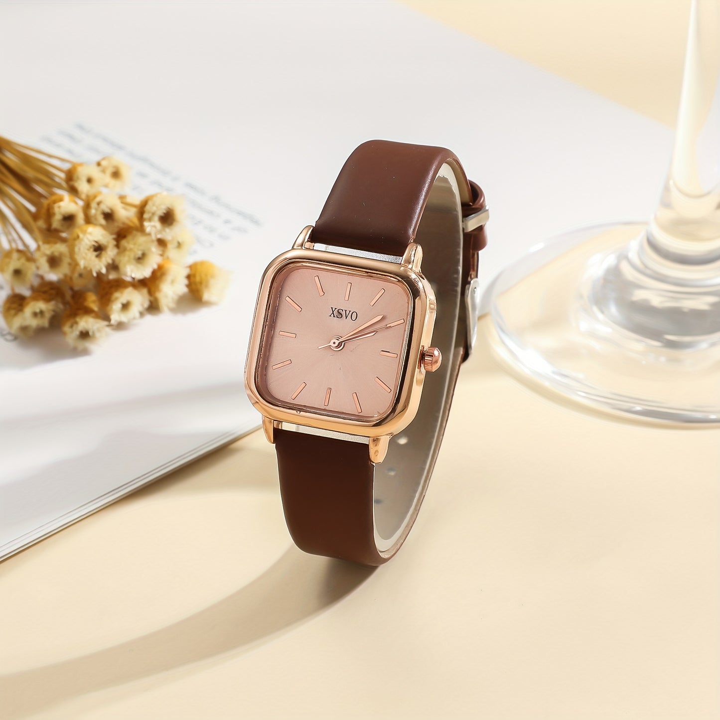 Women's casual square wrist watch with quartz movement, zinc alloy case, PU leather strap, electronic drive, and non-rechargeable button battery - a fashionable accessory for daily wear.