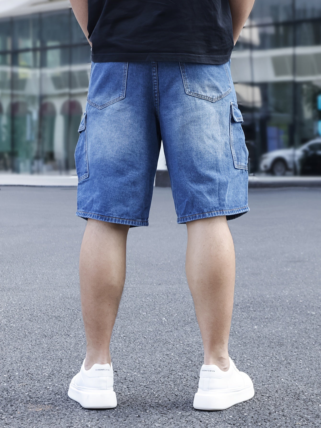 Men's plus size light blue denim shorts with casual fit, pockets, and classic style for casual attire.