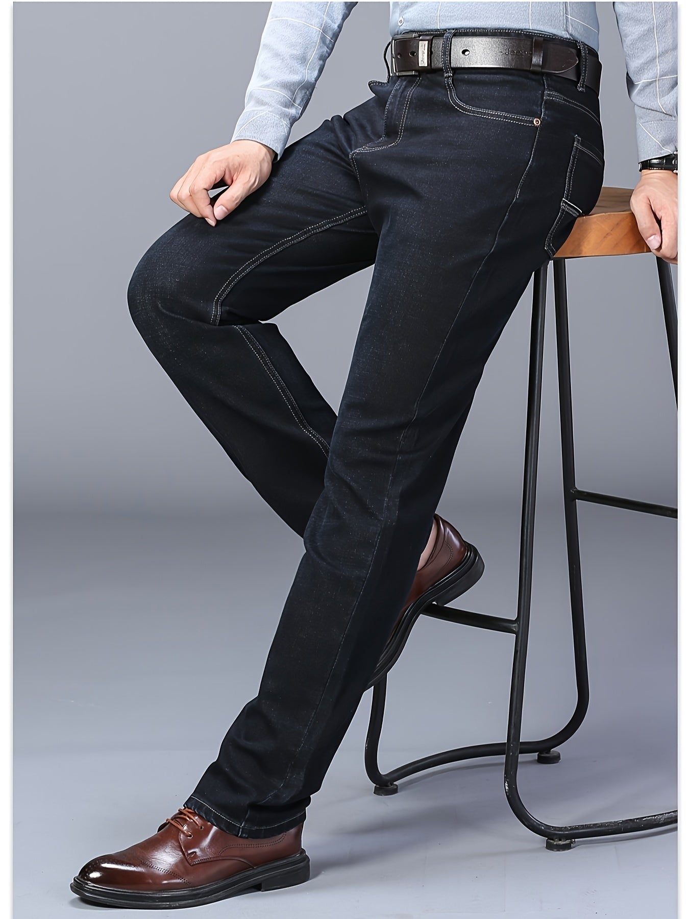 Straight leg denim jeans with classic design, slightly stretchy for versatility in business and leisure wear.