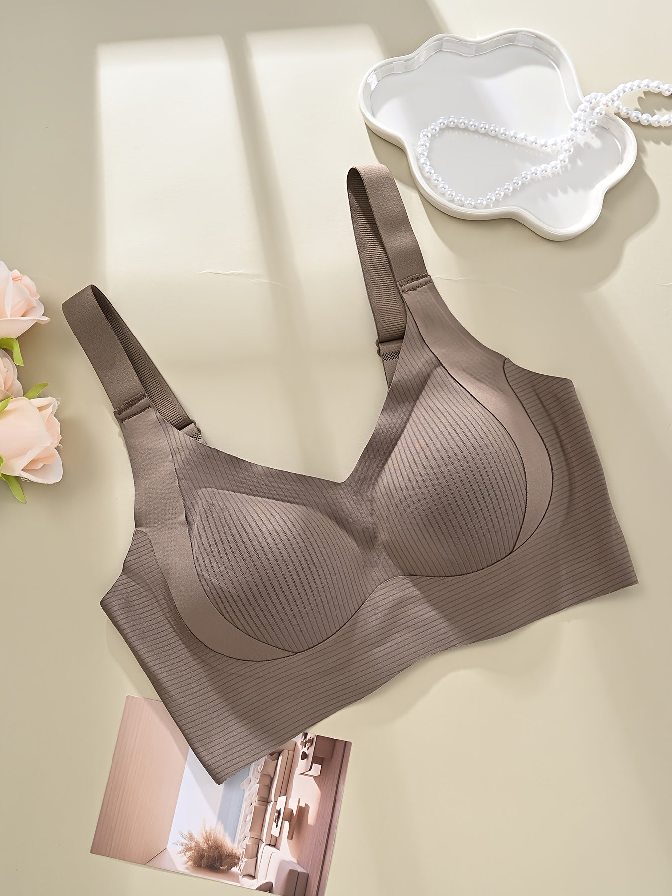 Elegant seamless wireless bralette with soft support and wide straps for comfortable daily wear.