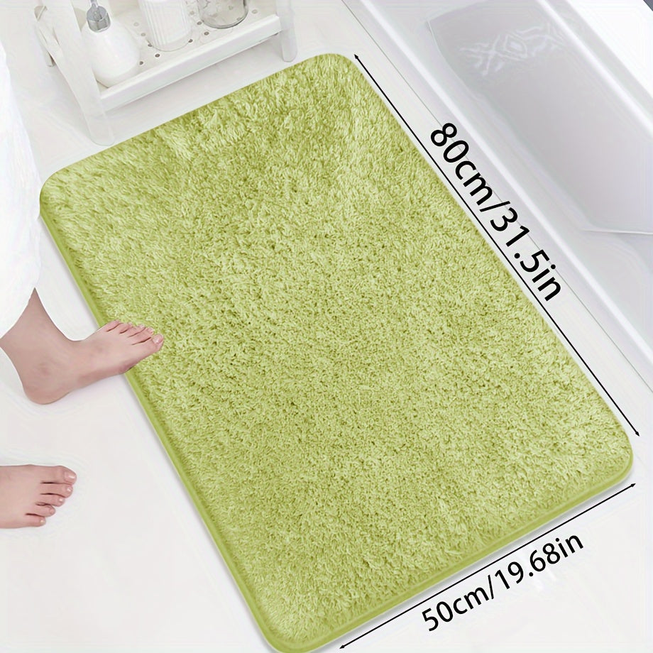 Soft and sumptuous purple bath mat offering luxury feel - highly absorbent, non-slip and fade-resistant, ideal for bathroom, bedroom and laundry room décor. Made from durable polyester, easy to clean.