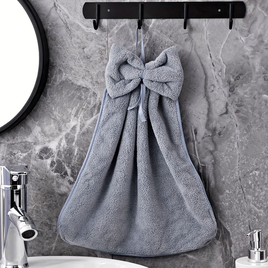 3-piece kitchen towel set with bowknot skirt pattern. Absorbent and quick-drying for household cleaning. Ideal kitchen essentials.