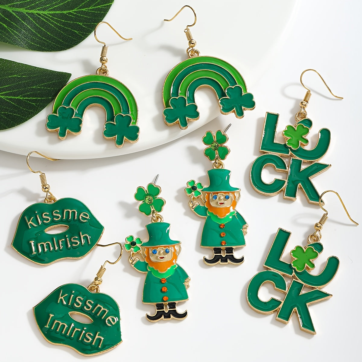 St. Patrick's Day Charm Earrings featuring a Lucky Clover and Rainbow Design adorned with Sparkling Rhinestones. Made with Stainless Steel Posts, these Earrings are crafted from Alloy, making them a Perfect Gift for Her. In Irish Green, Lip-shaped, Oil