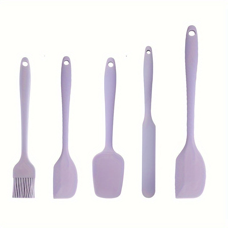 Set of 5-6 silicone spatulas, perfect for scraping cake cream and applying oil while baking. These tools are food-grade and also include a brush, making them essential kitchen gadgets and accessories.