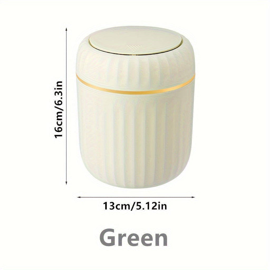 Press-top mini trash can made of durable PP material, ideal for office, bedroom, or living room. Equipped with lid for convenient waste disposal at home.