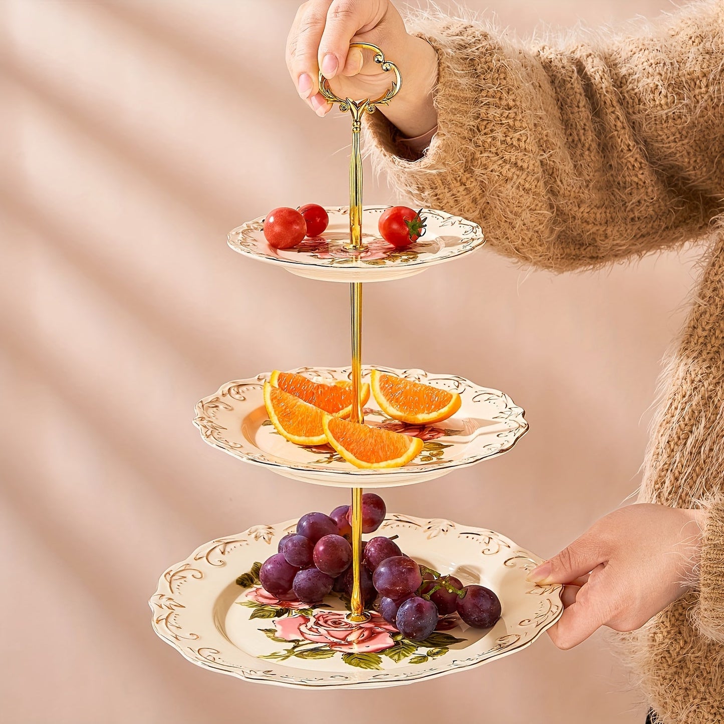 European-style 3-tier ceramic dessert stand featuring an embossed flower design and a sturdy metal bracket. Safe for food contact and does not require electricity. Perfect for weddings, holidays, birthdays, and tea parties.