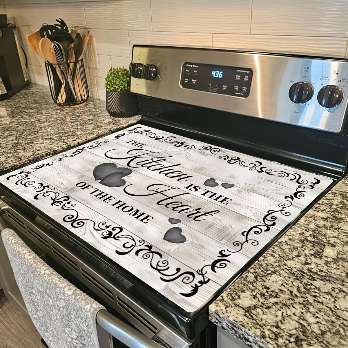 Transform your kitchen  with the "The Kitchen is the Heart of the Home" Diatom Mud Electric Glass Stove Top Cover. This versatile kitchen mat measures 72.39x52.07cm and features an anti-scratch rubber protective pad, making it ideal for use on ceramic