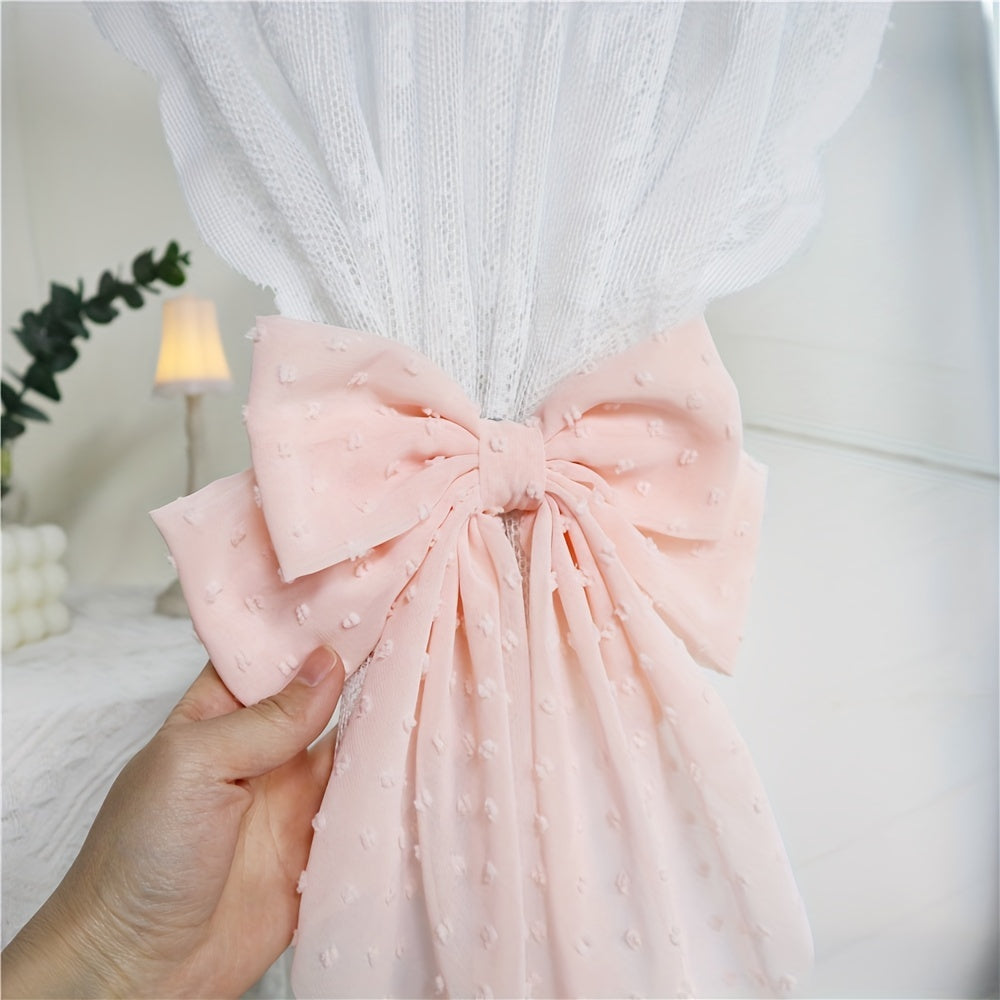 Add a touch of style to your bedroom, living room, and kitchen with these chic bow holdbacks for easy curtain control - the perfect accessory for stylish home decoration.