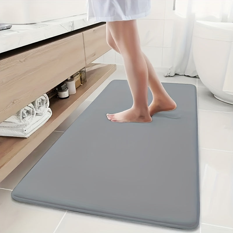 Super absorbent bath mat with non-slip backing, ultra soft and comfortable, perfect for your bathroom decor.