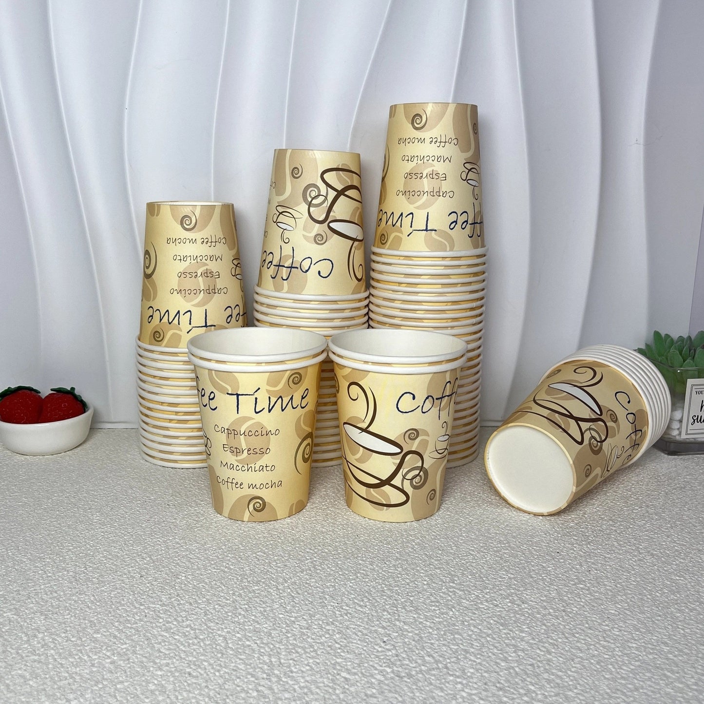 50 to 100 pieces of 8-ounce disposable paper cups ideal for household and commercial use. These hot drink paper cups are food-grade and perfect for coffee, juice, or water. Suitable for home and supermarket tastings, as well as lattes and milk teas.