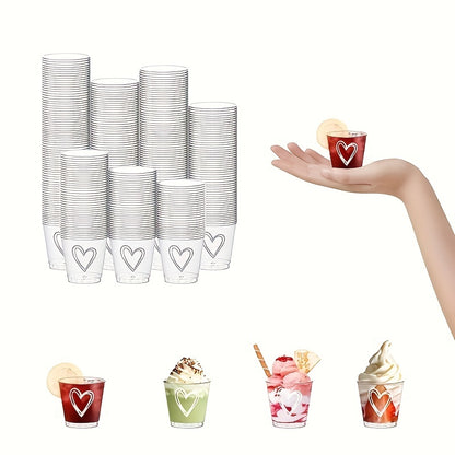 50 or 100 elegant heart-shaped disposable plastic cups with lids, ideal for weddings and parties. Recyclable, lead-free, and shatterproof, perfect for serving coffee, desserts, and more.