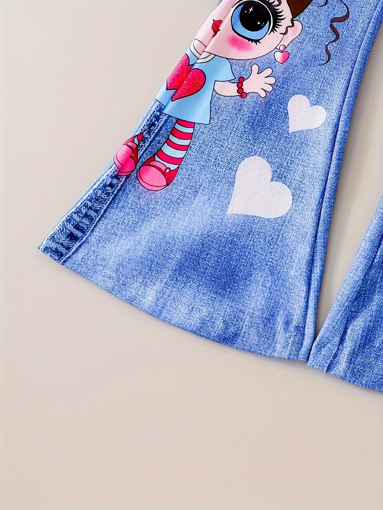 Imitation denim print flare pants with cartoon girl graphic, faux pockets for party gift.