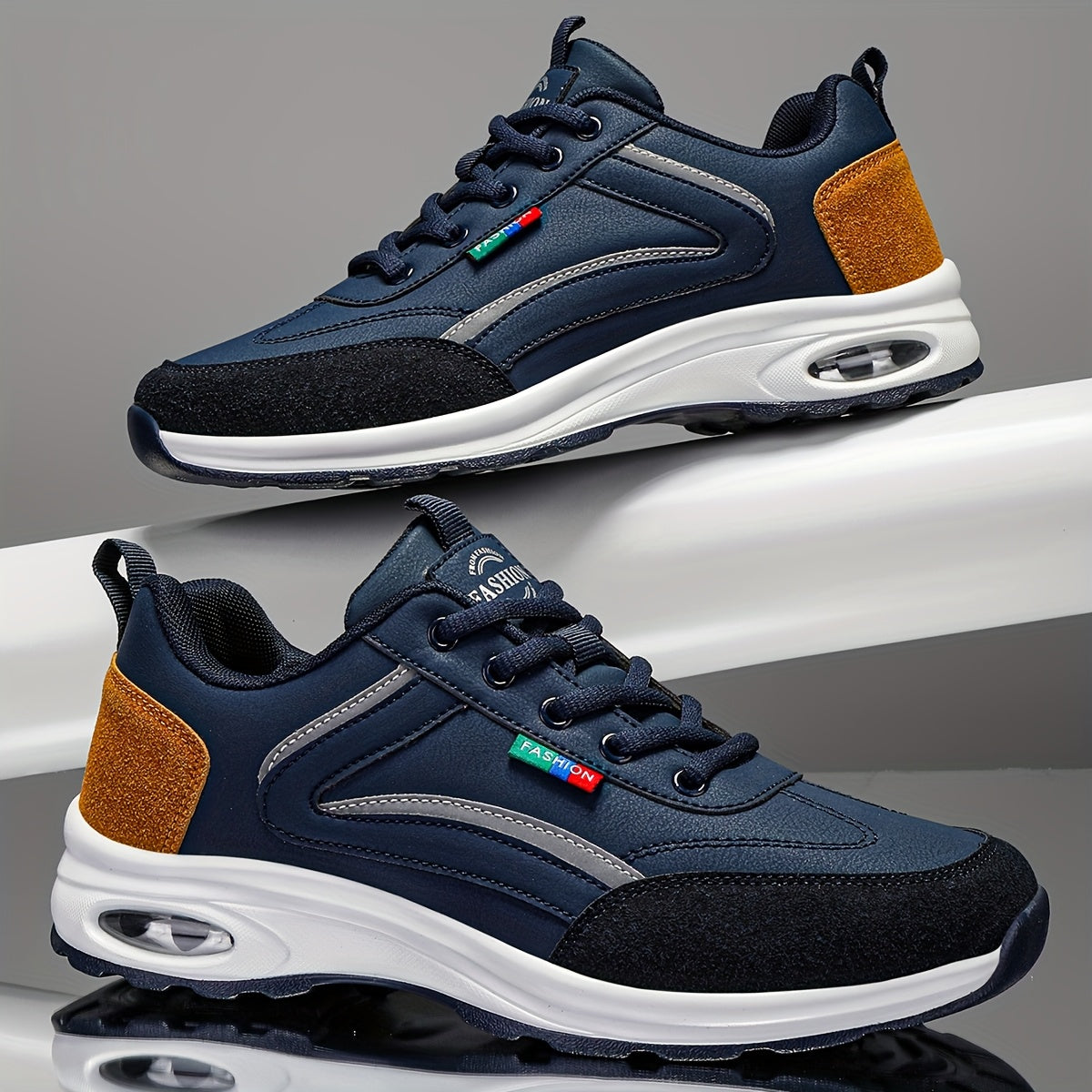 Men's two-tone road running shoes with air cushioning, durable rubber sole, fabric lining, lace-up closure, and low-top design for all seasons.