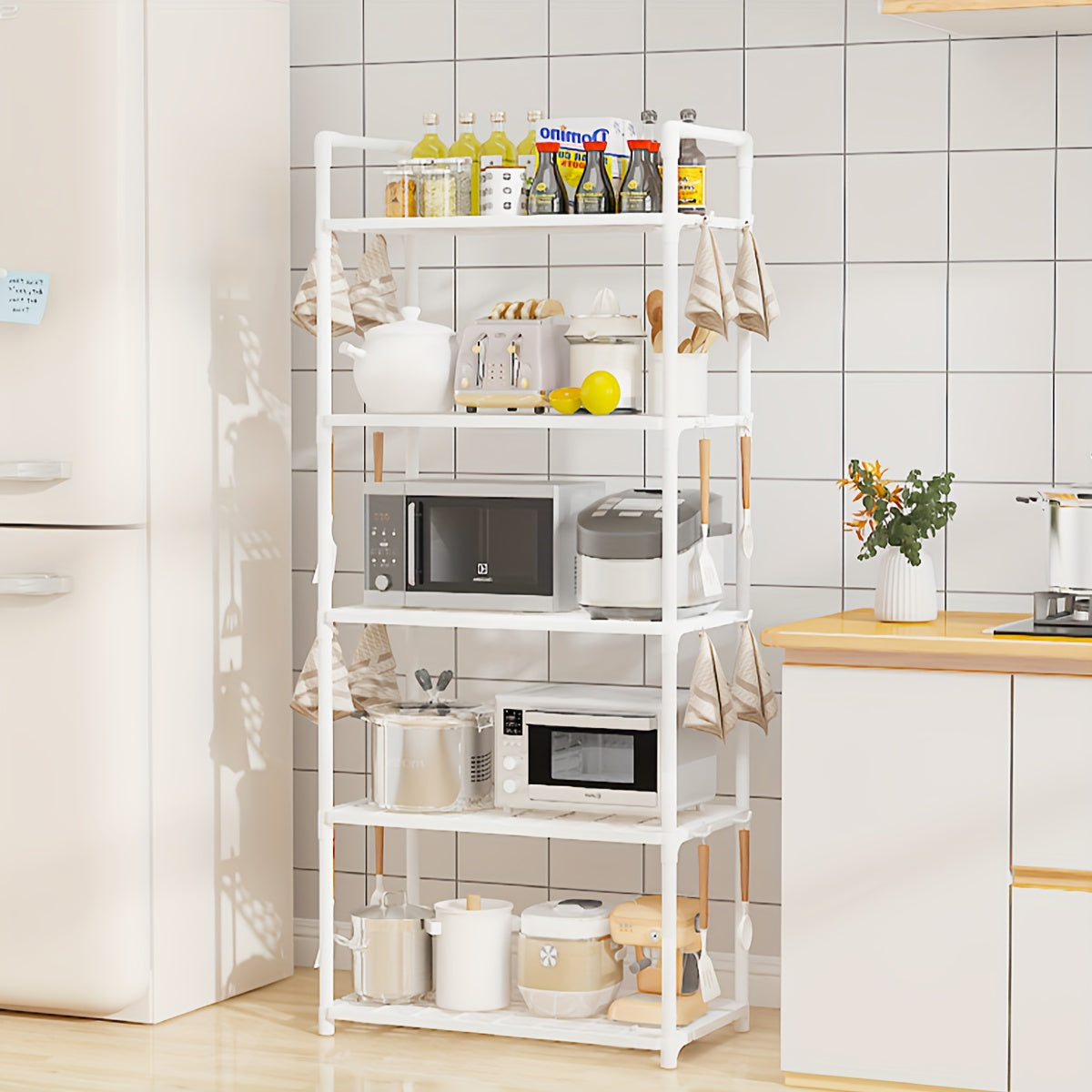 4-Tier Storage Rack Set with Versatile Uses - Simple Assembly, Constructed with Galvanized Metal & Plastic, Compact and Portable for Organizing Kitchen and Bathroom Items.