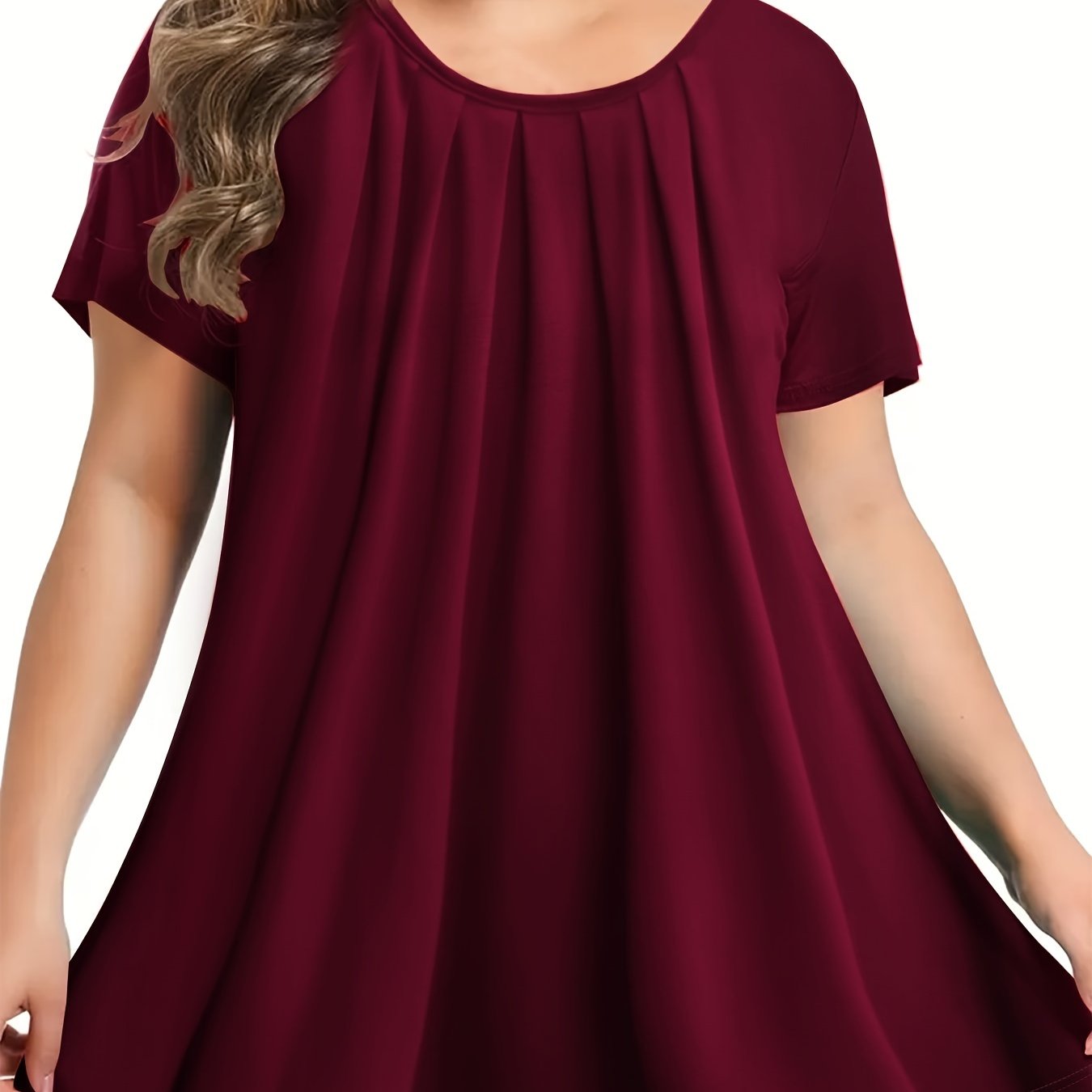 Loose-fitting round neck top for plus-size women.