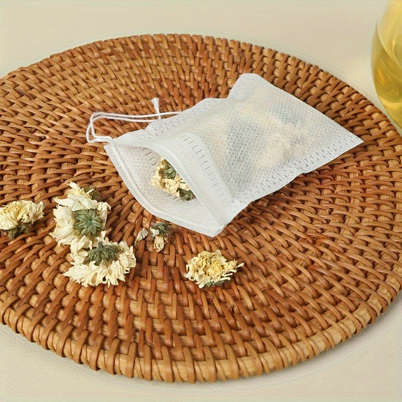 100 pieces of Disposable Drawstring Tea Bags for Loose Leaf Tea, perfect for use in restaurants, hotels, family gatherings, theme parties, weddings, and birthday parties.