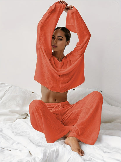 Women's two-piece set of loose and comfortable home clothes made with micro-permeable fabric, featuring round neck and long sleeves.