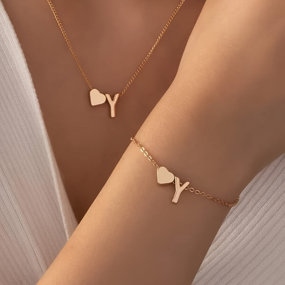 Chic two-piece set with metal heart and letter necklace and bracelet, ideal for daily wear.