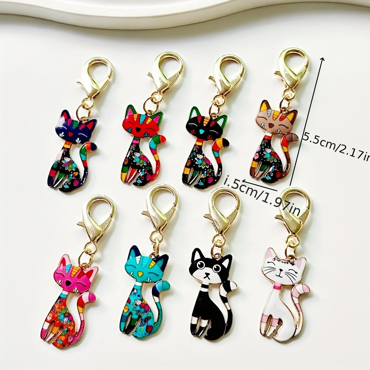 A collection of traditional cat-shaped keychains, 8 stylish zinc alloy keychains, whimsical cartoon animal pendants, perfect for embellishing handbags, car keys, and backpacks. Great for everyday use or as unique party favors for school events.