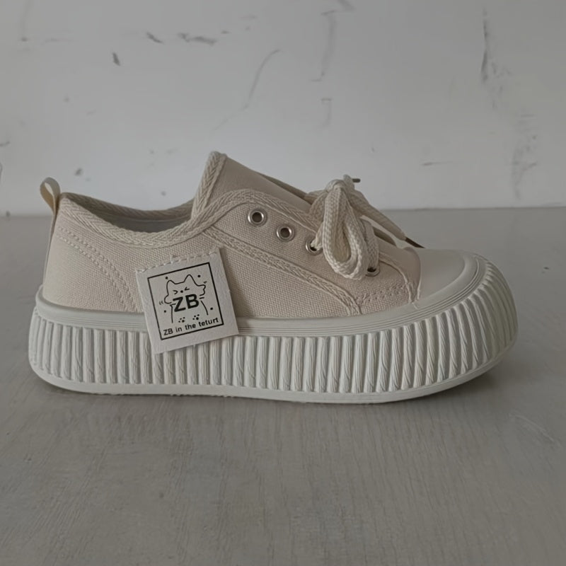 Women's casual sneakers with waterproof platform, non-slip sole, lace-up closure for outdoor use, breathable flats with round toe, rubber sole, and comfortable low-top style for any season.