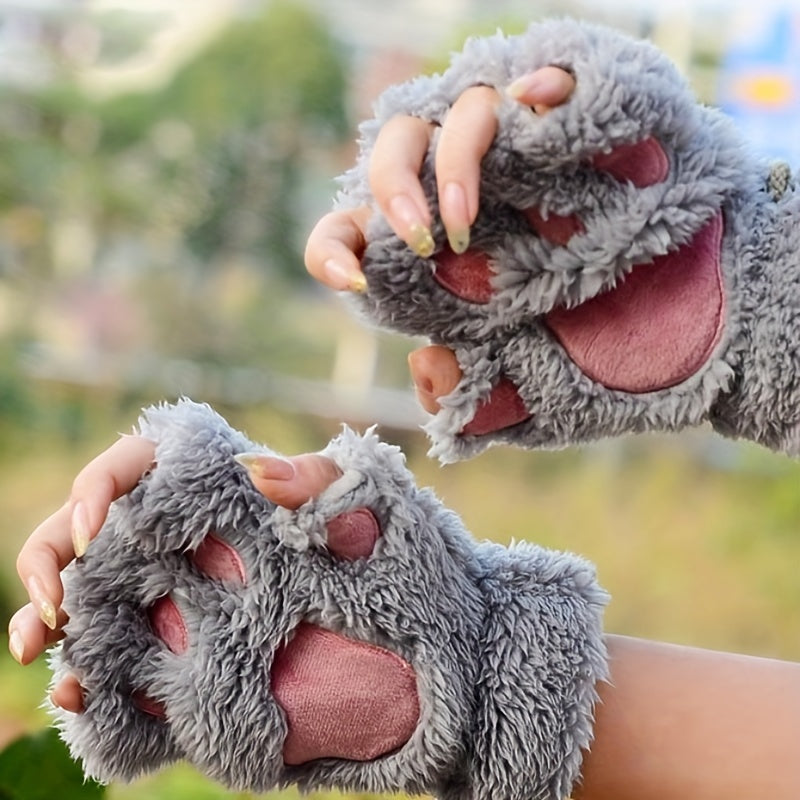 Stylish and cozy, these Cute Cat Claw Plush Gloves provide warmth and comfort in the cold seasons. The half finger design adds a trendy touch to these thick, fuzzy gloves, making them perfect for autumn and winter.