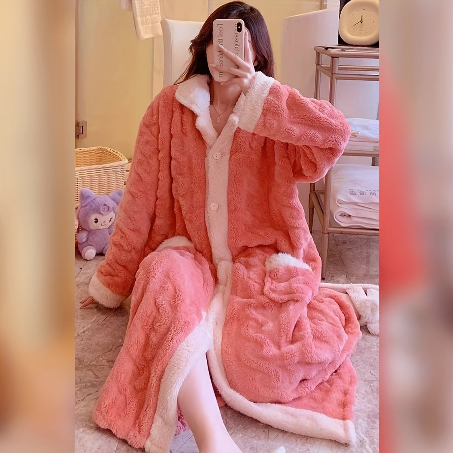 Soft and plush pink coral velvet women's bathrobe with contrast trim. Machine washable for cozy Autumn and Winter lounging.