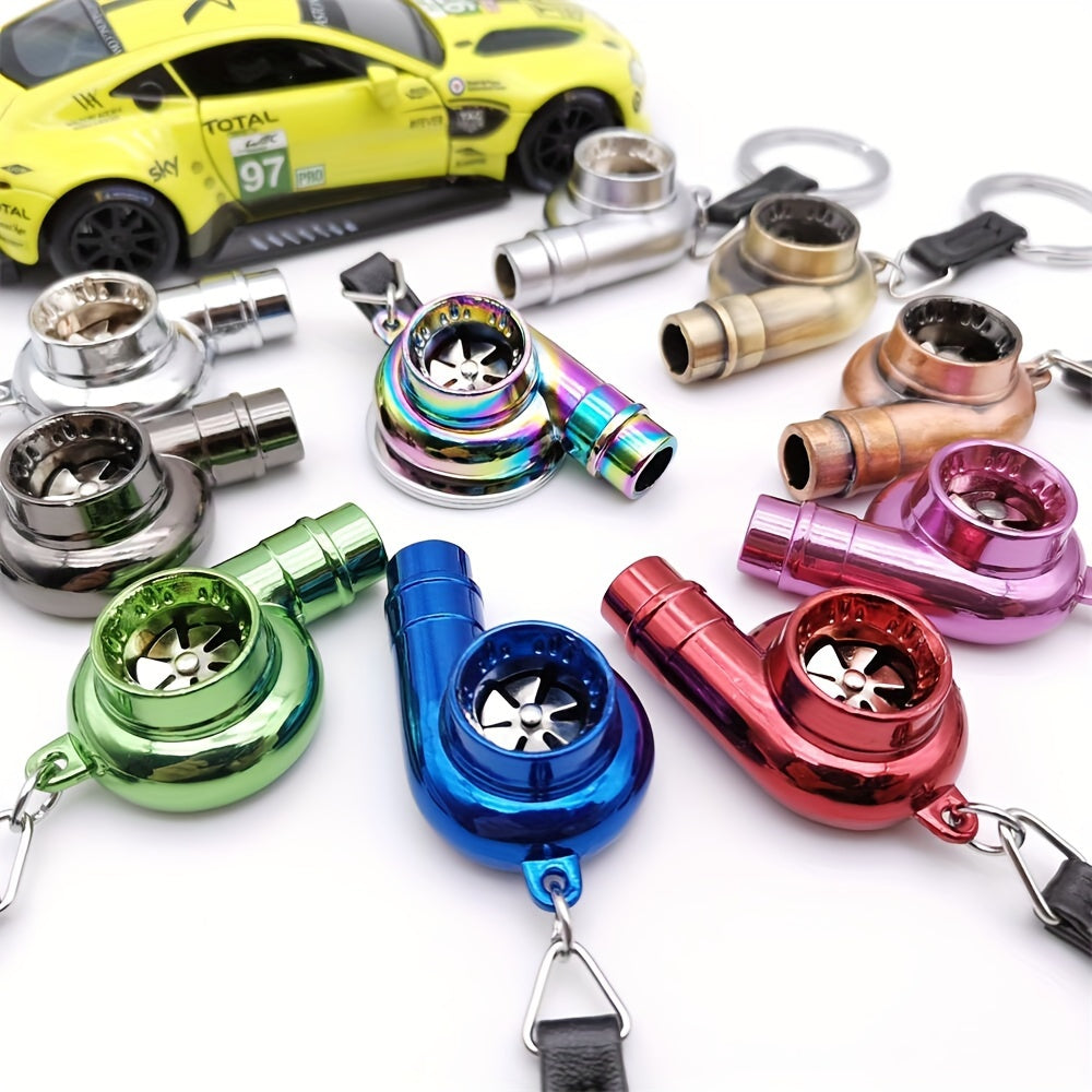 Keychain featuring a rotating turbine design, perfect for car enthusiasts. This creative accessory also doubles as a key holder and includes a turbine whistle feature. Ideal as a unique gift option.