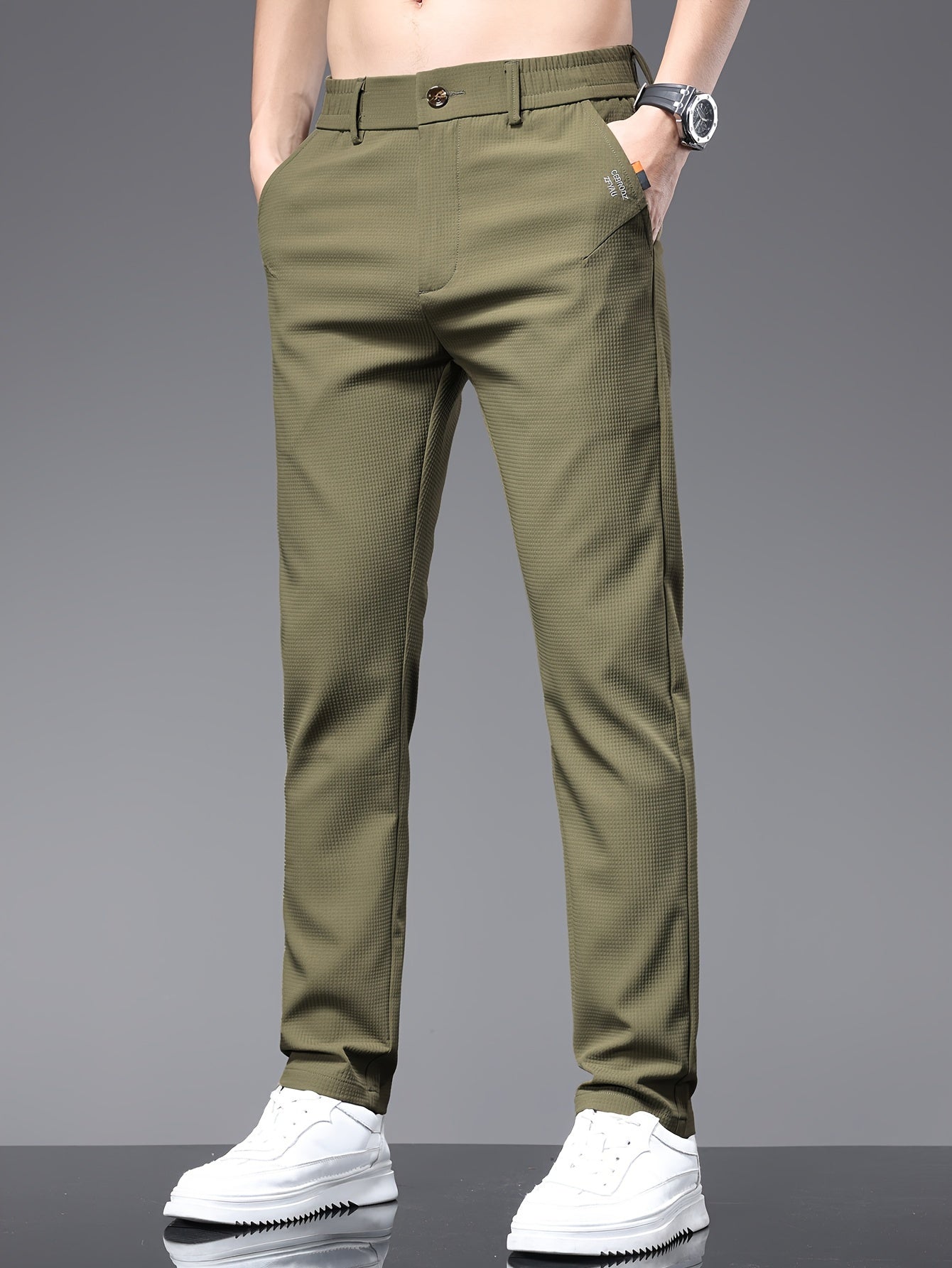 Men's slim fit pants with pockets, perfect for outdoor activities in spring and autumn.