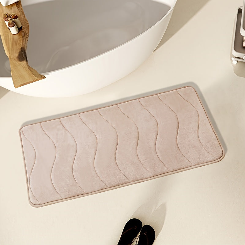 Soft and comfortable bath mat with high absorbency - ideal for bathrooms, showers, and bathtubs. Rectangular in shape, waterproof, and easy to clean.