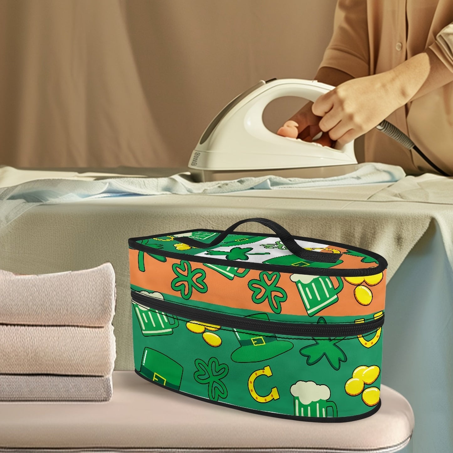 Portable ironing bag with St. Patrick's Day cloverleaf design, perfect for travel or storage. Features top handle and double zipper for easy access. Made of polyester material, dust proof. Ideal holiday gift for anyone in need of a stylish accessory.