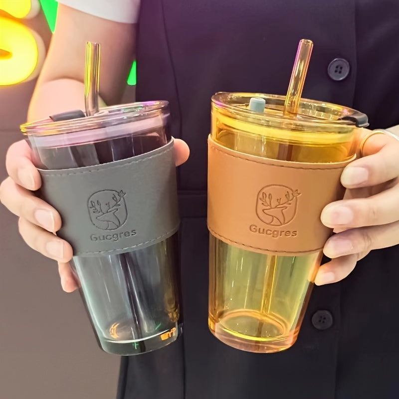 Stylish bamboo-inspired glass mug with straw, ideal for coffee and milk tea