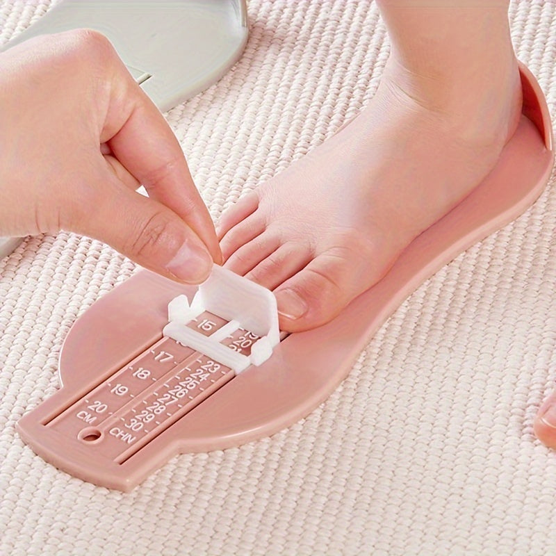 Baby foot measuring tool for shoes sizes.