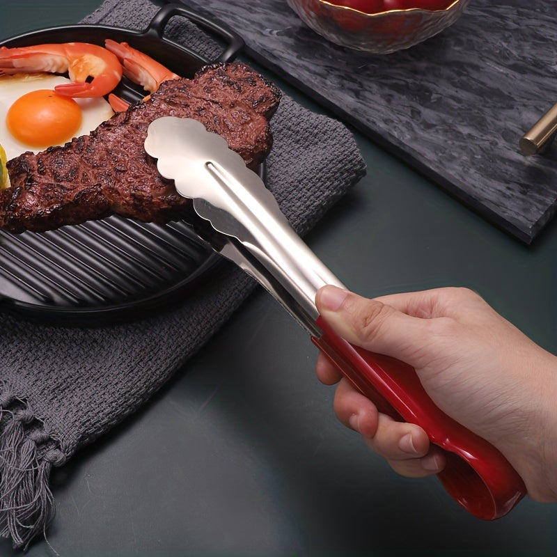 1 pc Stainless Steel Tongs for BBQ and serving. Non-slip and multi-functional. Great for grilling and buffet. Kitchen essential.