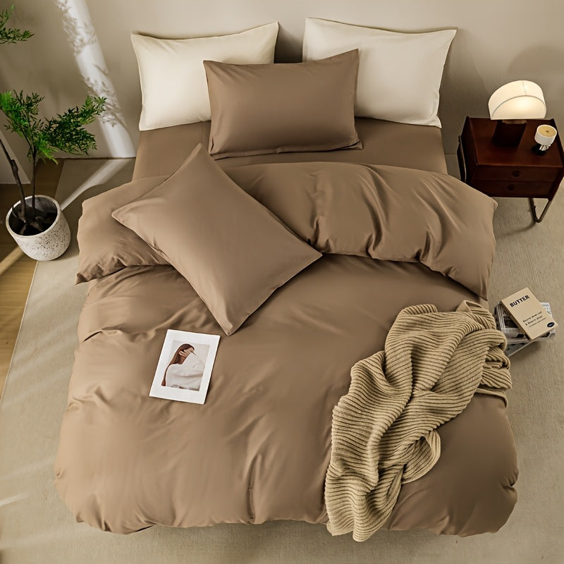 High-quality bedding set for home and hotel use, includes one duvet cover and two pillowcases. Made from soft, premium materials in a skin-friendly solid color design.