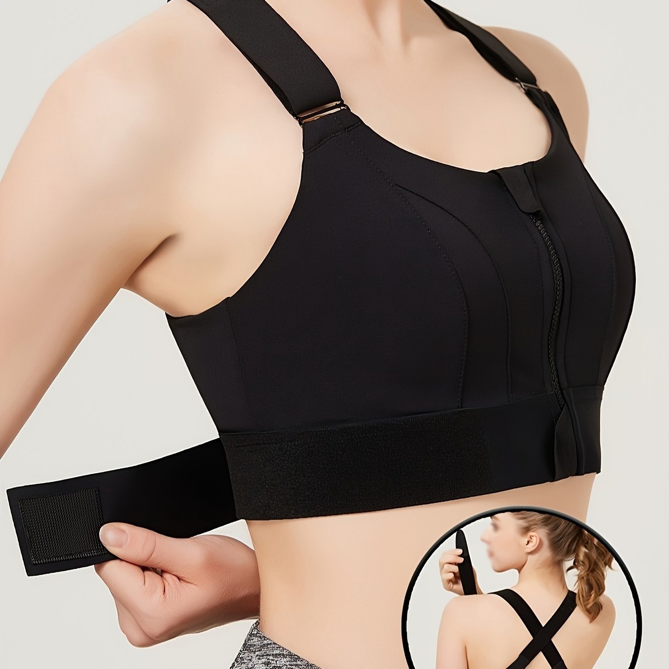 Women's Plus Size high support racerback sports bra with front zipper, adjustable straps, non-removable pads, made of polyester fabric. Suitable for yoga, Zumba, and running.