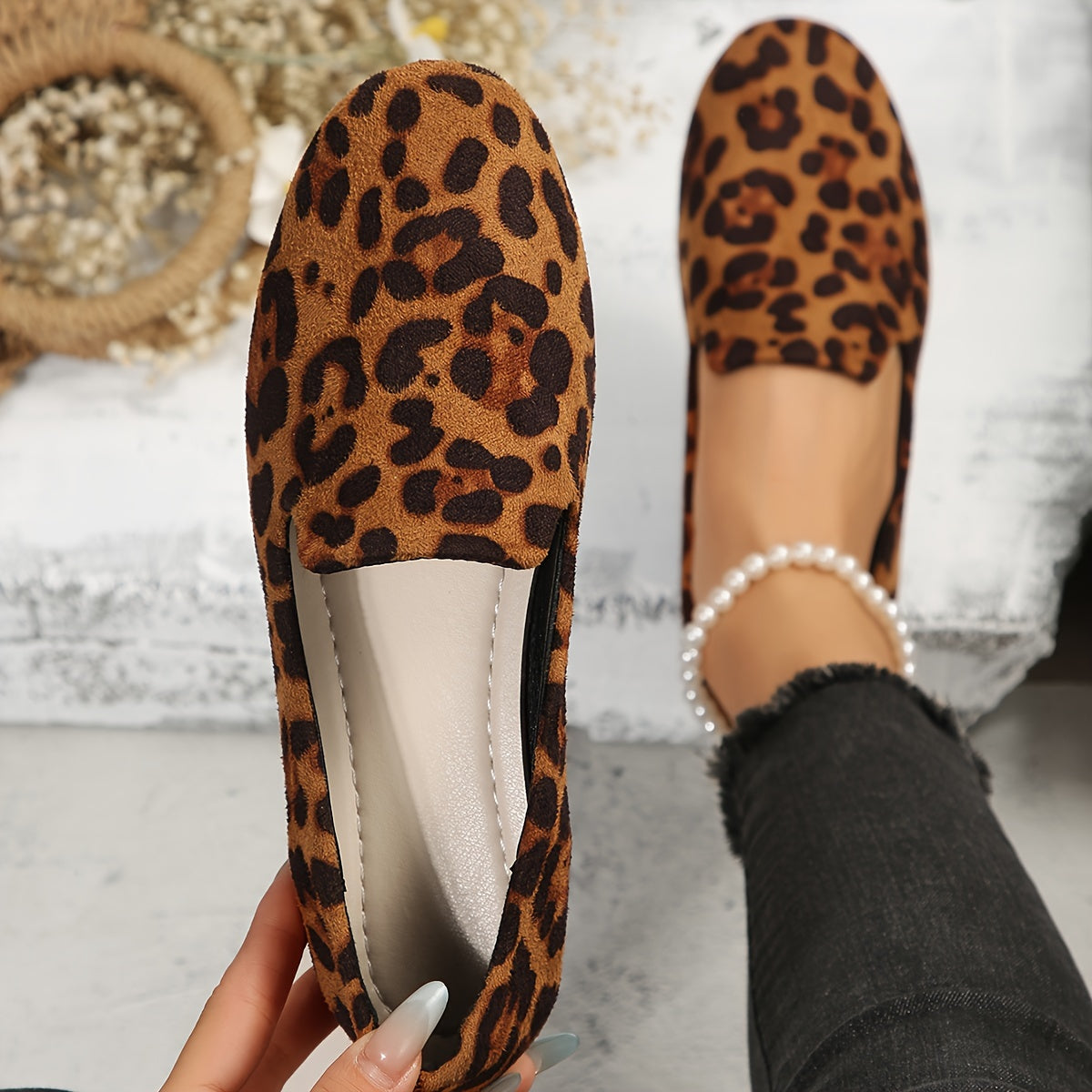 Leopard print women's flats with lightweight slip-on design, plain toe, fabric upper, and plastic sole - perfect for all seasons and versatile boat-style footwear.