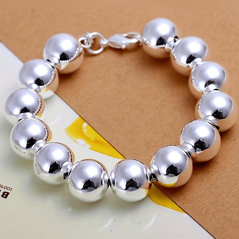 This elegant 925 sterling silver beaded bracelet features a vintage style with no plating, making it a classic jewelry gift suitable for daily wear and special occasions. It is perfect for celebrating Mardi Gras and serves as a versatile accessory that