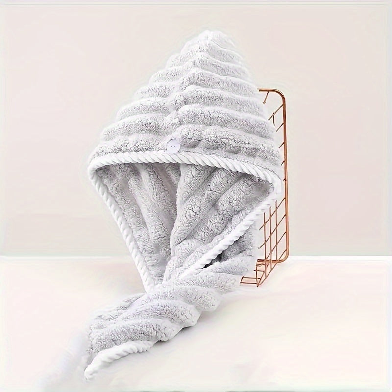 Stay dry and stylish with our Ultra-Soft Coral Fleece Hair Towel Wrap. Made with quick-drying ultra-fine fibers, this pink striped design is perfect for long and short hair. Elevate your bathroom routine with this versatile accessory that can be used as