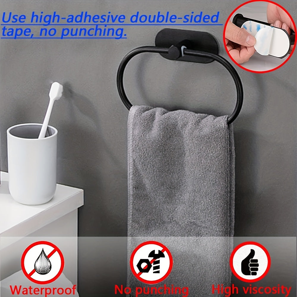 Self-adhesive stainless steel bathroom accessories for towel and dishcloth storage.