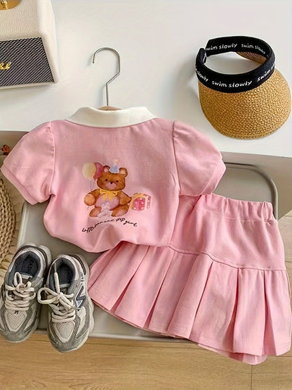 Pink floral short-sleeve collared top and pleated skirt set for charming girls, made from cotton blend fabric, ideal for casual wear in summer.