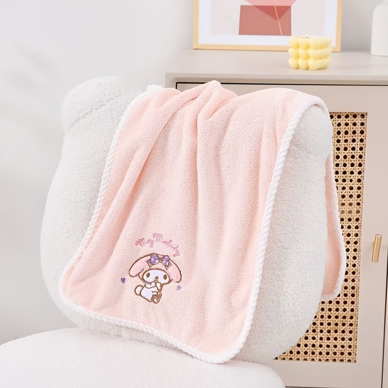 Contemporary cartoon-themed Hello Kitty and Friends plush bath towels in knit fabric made from a 40% cotton, 60% acrylic blend. Featuring a checkered pattern, low lint, 280gsm, and oblong shape, ideal for wash cloths.