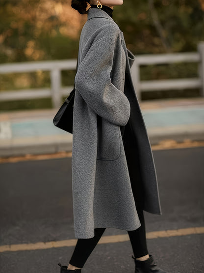 Women's elegant long sleeve coat in a solid color, regular fit, H-shape, perfect for autumn/winter fashion. Features include pockets and made of polyester fabric. Special collection item.