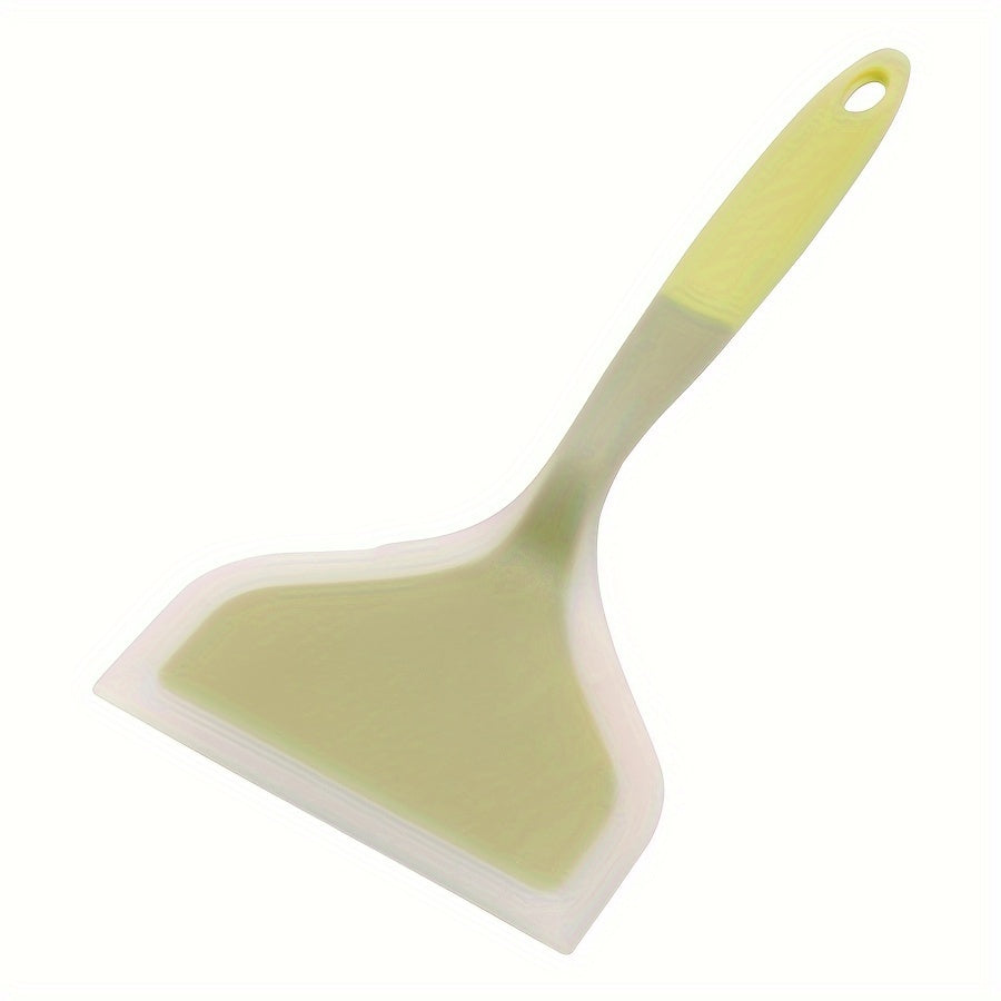 Nonstick silicone spatula turner for pancakes, eggs, fish, pizza, and steak. Heat-resistant and wide for easy flipping. Kitchen utensil accessory.