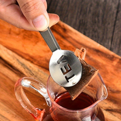 Get yourself a 1pc Stainless Steel Tea Bag Squeezer - a versatile tool that functions as a Tea Bag Clip, Strainer, and Scoop. Perfect for handling loose leaf tea, ice cubes, and sugar. Makes for an excellent gift for occasions like Christmas, Halloween