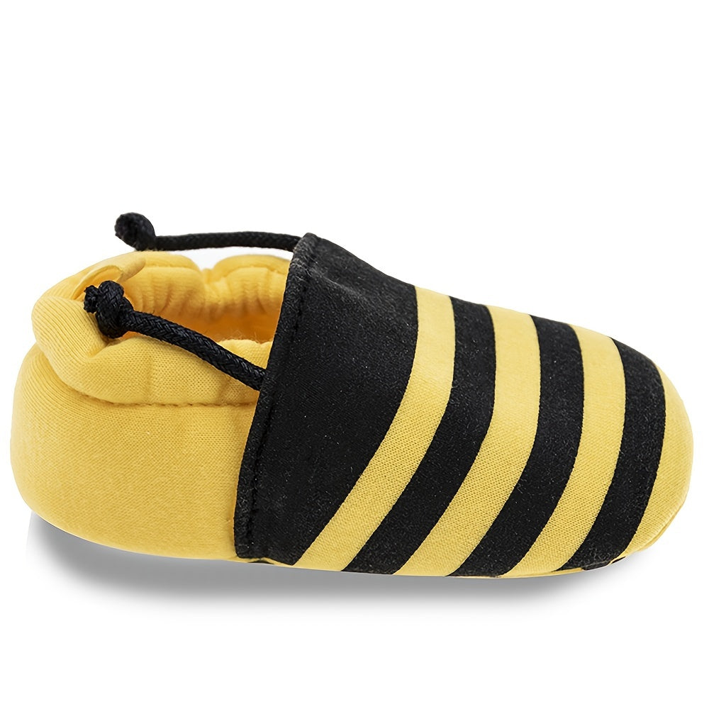 Baby slip-on walking shoes with cute bee cartoon design, fabric upper, cloth insole, and fabric sole suitable for all seasons.