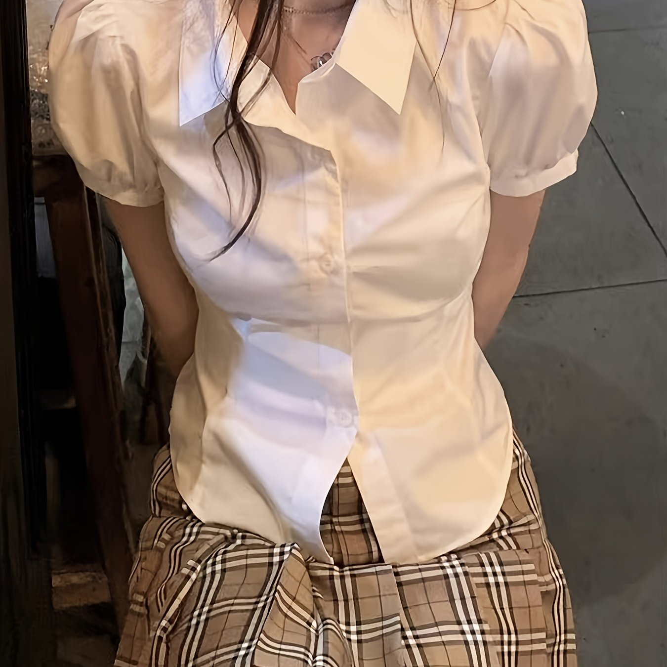 Stylish white blouse with tie-waist detail for women - perfect for casual wear.