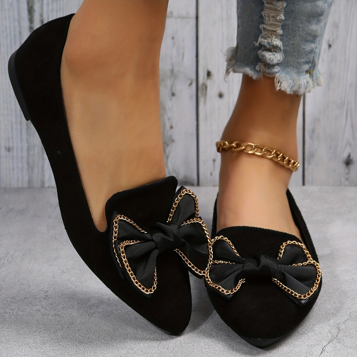 Leopard print flat shoes with bowknot decor and point toe, lightweight slip on style.