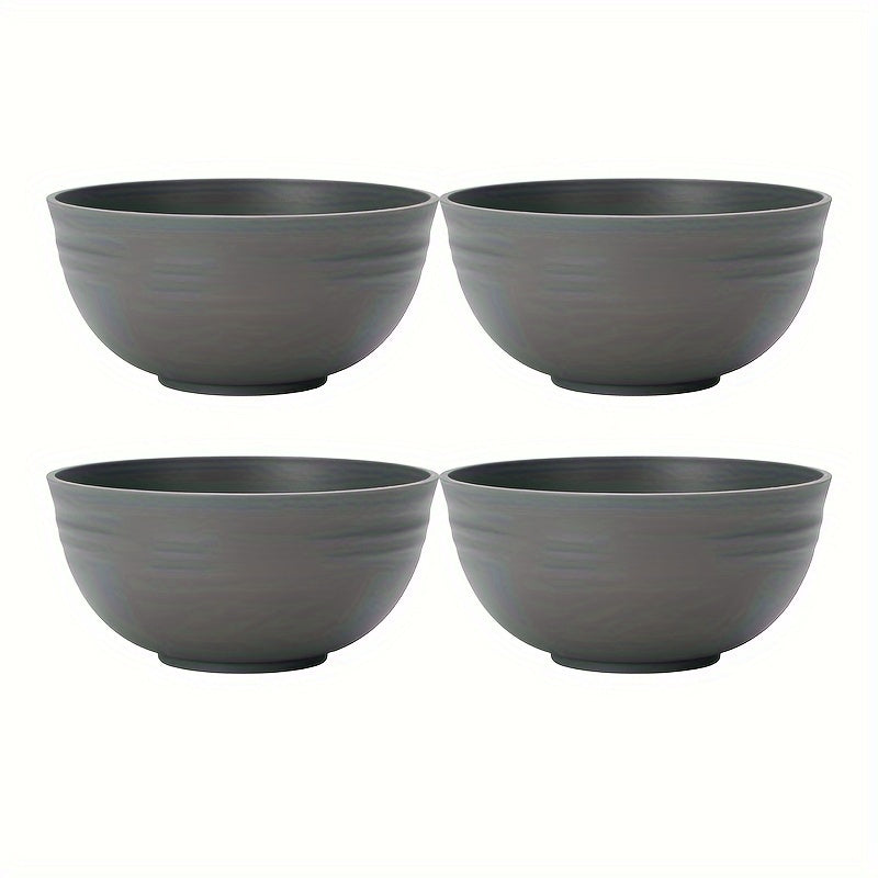 Durable plastic bowls safe for microwave use, perfect for meals at home or on-the-go. Offered in sets of 2, 4, or 6.