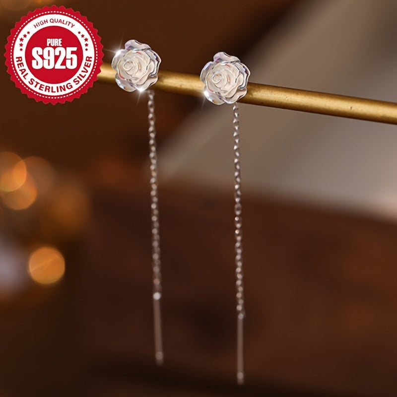 These sophisticated and minimalist tassel earrings feature white roses and are crafted in S925 silver for women. Each pair weighs just 0.7g, making them perfect for everyday wear with a low risk of allergies.