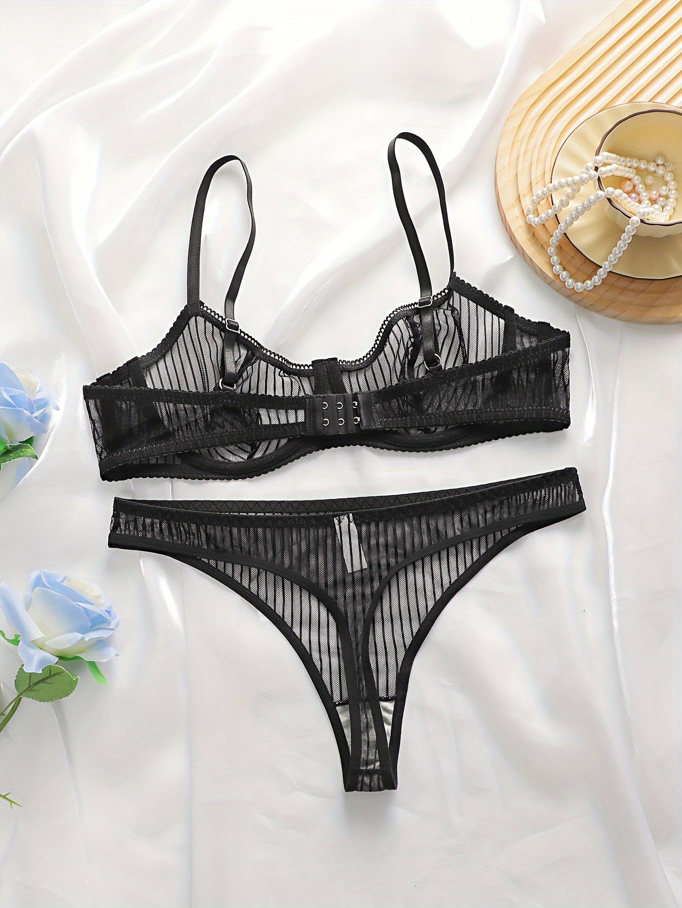 French-style lingerie with ultra-thin fabric, lace details, and underwire support.